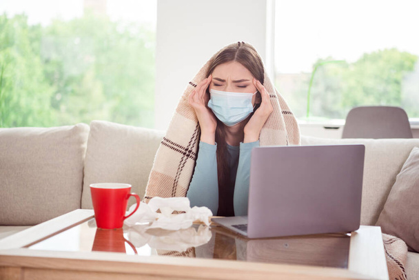 Photo portrait young woman working from home on quarantine suffering from covid - Foto, imagen