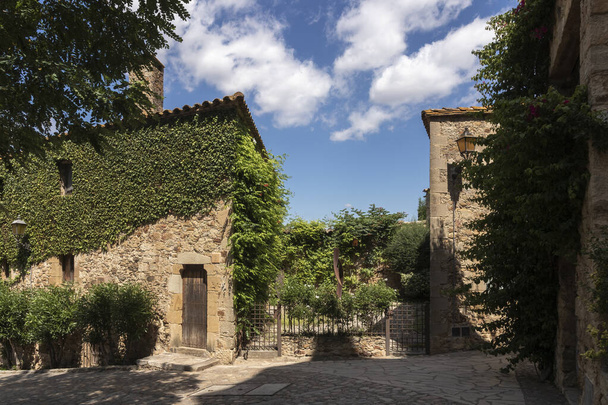 stone house on the costa brava in the town of pals a sunny day - Photo, Image