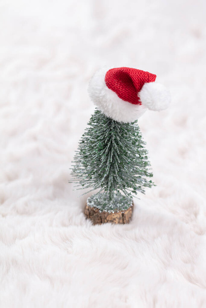 Christmas little trees and wool background. - Photo, image