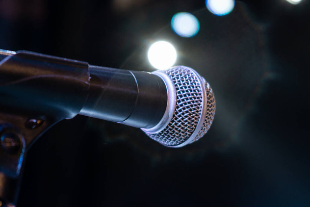 Microphone for singing with stage lights in the background - Fotoğraf, Görsel