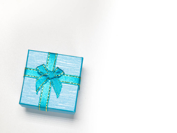 Blue gift box for lovers on white background. gift box for festival - Zdjęcie, obraz