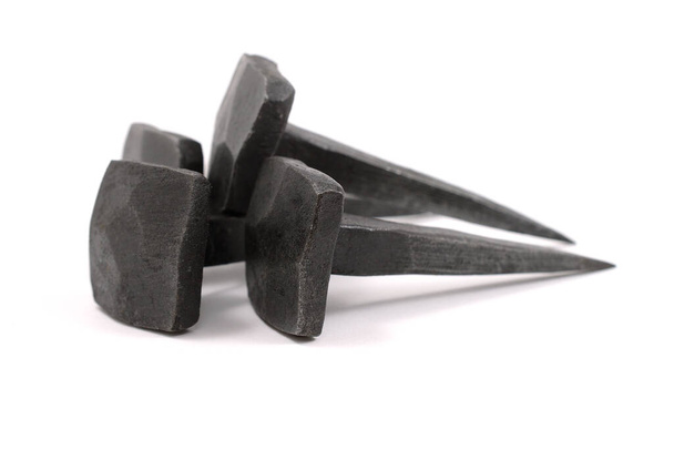 iron forged nails on a neutral background - Photo, Image