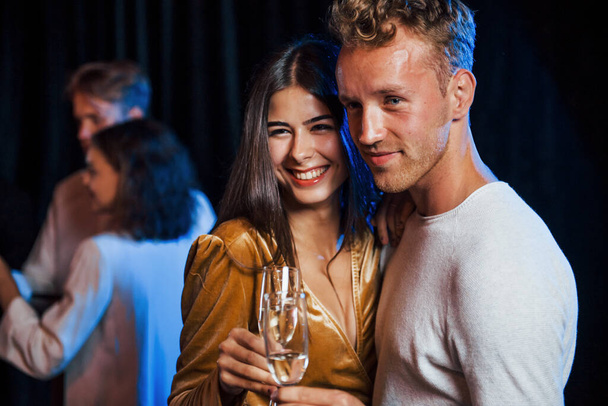 Portrait of lovely couple have party together with their friends. - Фото, зображення