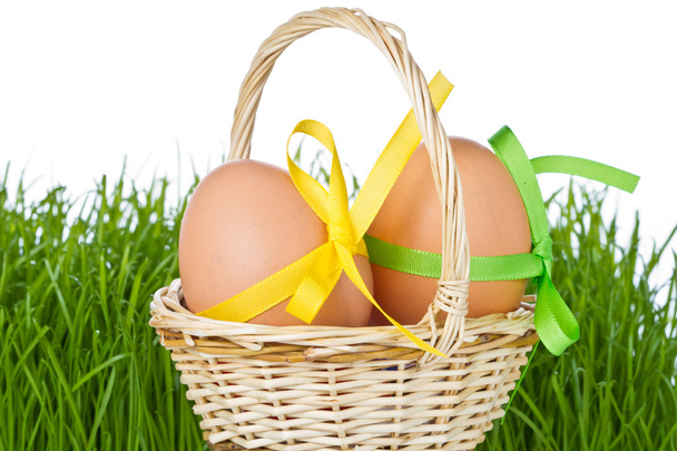 Basket with easter eggs - Фото, изображение