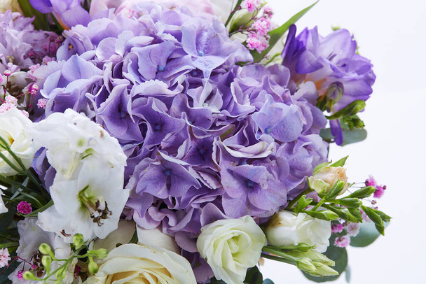 a wedding bouquet  isolated on white. Fresh, lush bouquet of colorful flowers. Close up - Foto, afbeelding