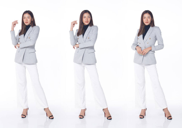 Collage Group Ganzer Figurensnapf der 20er Jahre Asiatin braune Haare Business-Anzug Hose und High Heels Schuhe. Weibliche Stände posieren mit zufriedenem selbstbewusstem Lächeln über weißem Hintergrund - Foto, Bild