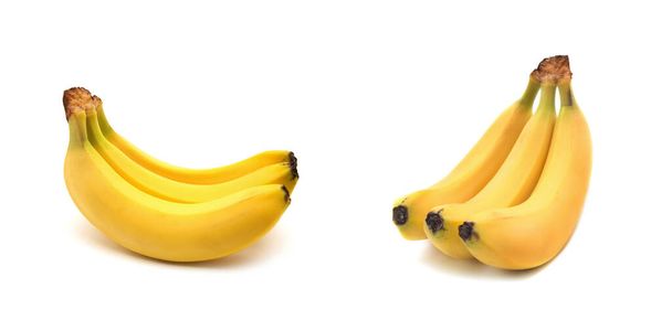 白地に隔離されたバナナの束 - 写真・画像