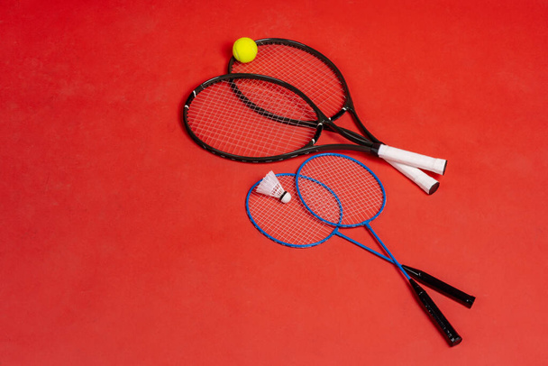 Four rackets. Rackets for tennis and for badminton - Valokuva, kuva