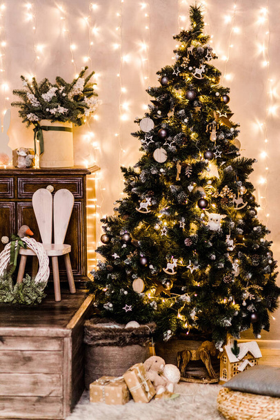 Christmas, New Year's decor of the children's room made of natural materials in dark colors. Photo - Foto, Imagem
