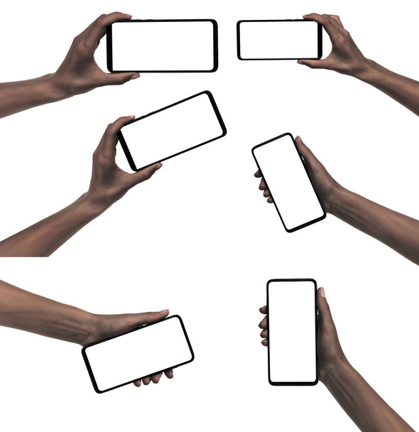 Kolaż afro kobieta ręka trzymając czarny nowy smartfon z pustym ekranem izolowane białe tło. ustawić ręce za pomocą ścieżki wycinania telefonu - Zdjęcie, obraz
