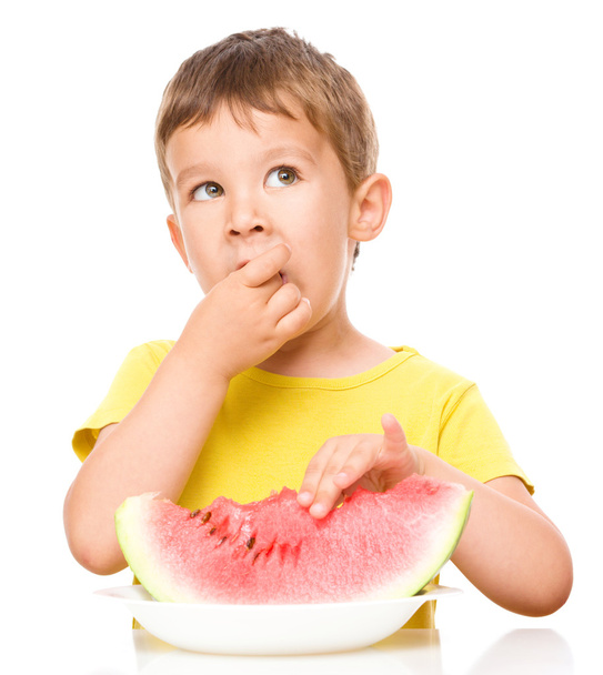 Little boy is eating watermelon - Fotó, kép
