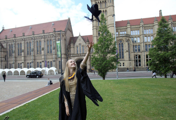 Portrait of a happy woman on her graduation day at university. Education and people. - Zdjęcie, obraz