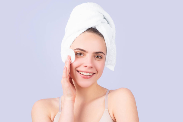 Beauty face portrait. Spa therapy, beautiful woman in towel takes care of skin. - Fotoğraf, Görsel