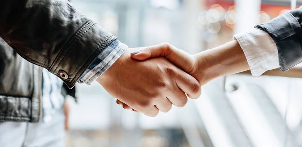 Man and woman hand shaking. Handshake after good cooperation, Businesswoman Shaking hands with Professional businessman after discussing good deal of contract. Business concept. - Fotoğraf, Görsel