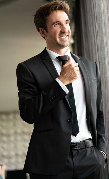 Portrait of a handsome happy businessman in suit - Foto, Imagem