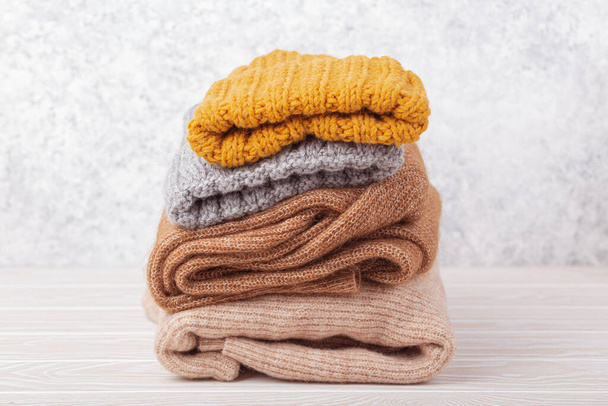 Pile of warm knitted clothes - Photo, Image