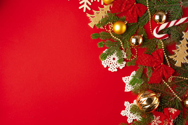 Christmas decorations background on red with copy space - Фото, зображення