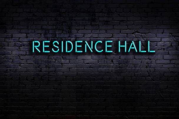 Neon sign on brick wall at night. Inscription residence hall - Photo, Image