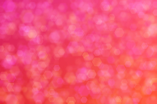 Background with beautiful orange and pink colors and their mixture with hexagon shaped bokeh pattern. - Fotografie, Obrázek