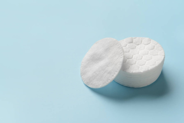 Stack of soft cotton pads on color background - Photo, Image