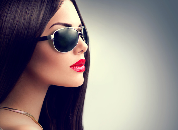 Girl wearing sunglasses - Fotó, kép