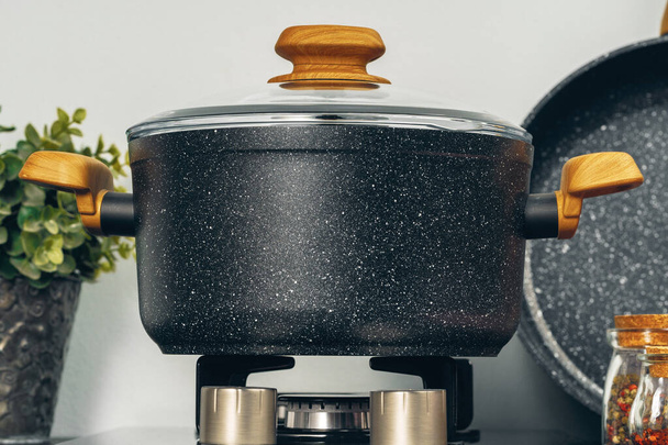 Clean saucepan on a gas stove in kitchen - Foto, Bild
