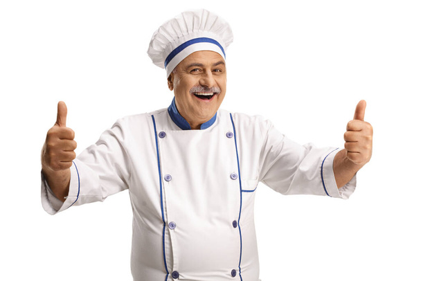 Cheerful mature male chef showing both thumbs up isolated on white background - Fotoğraf, Görsel