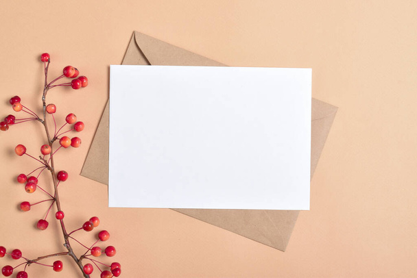 Postcard template on a beige background with an autumn branch of an apple tree. - Photo, Image