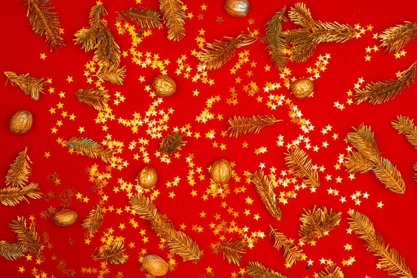 Christmas pattern of holiday decorations on red background - Φωτογραφία, εικόνα