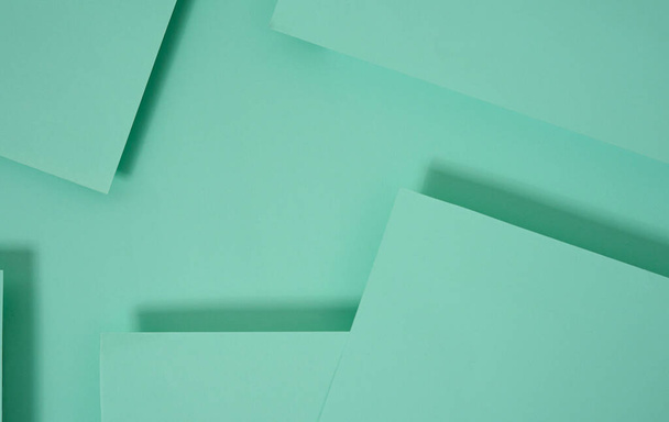abstraktní pop-up pozadí papíru v zelené barvě. abstraktní uspořádání vybudovat geometrickou texturu pro tapety, plakáty, letáky, atd.. - Fotografie, Obrázek