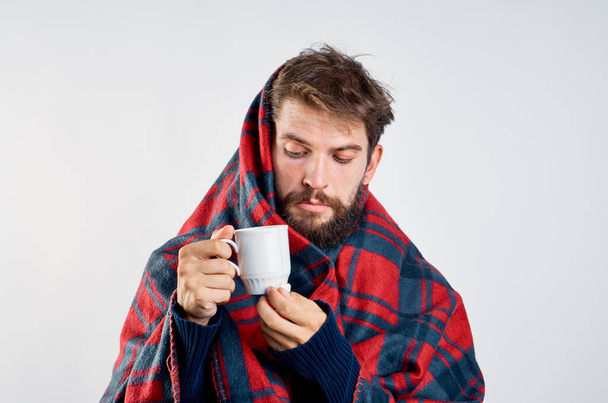 cold man with blanket warming drink health problem - Zdjęcie, obraz