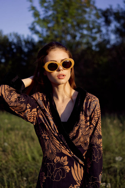 fashionable woman in sunglasses outdoors summer glamor - Photo, Image