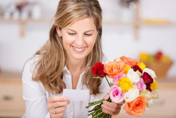 Woman with bunch of flowers - Foto, Bild