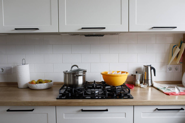 stove and saucepan, yellow bowl - Photo, Image