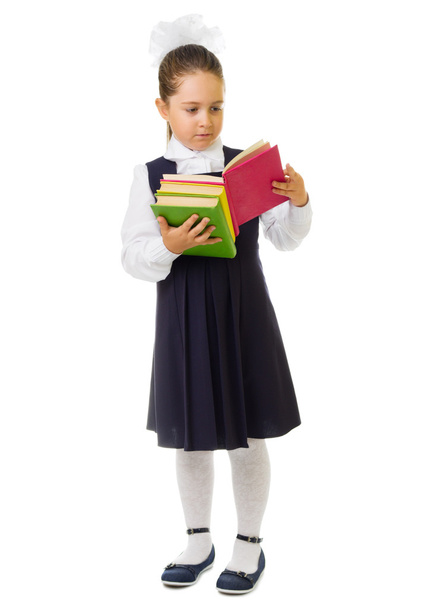 Little schoolgirl with books - Foto, Imagem