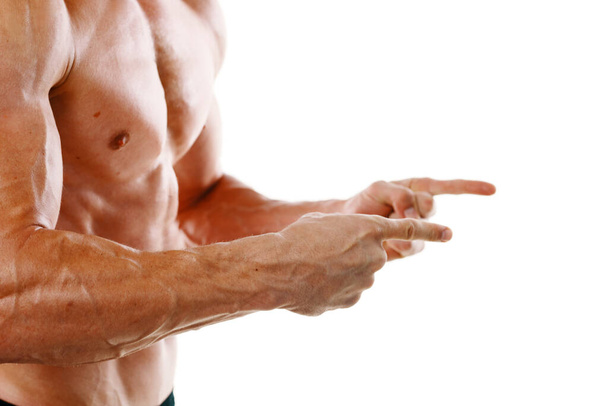 man with a pumped up body muscle closeup workout bodybuilders - Zdjęcie, obraz