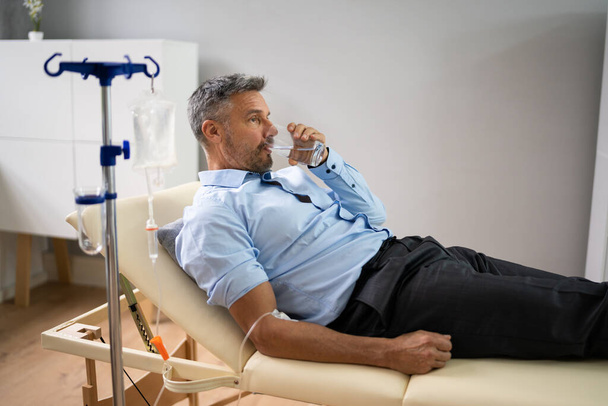 Vitamin Therapy IV Drip Infusion In Man Blood - Foto, Imagem