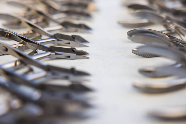A closeup of dental instruments on the table - Foto, afbeelding