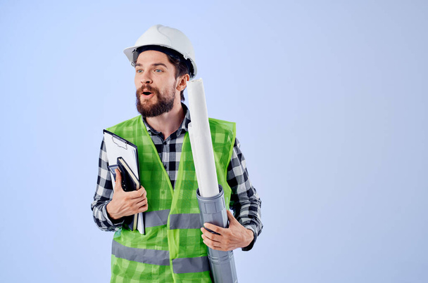 male builder with documents and drawings. High quality photo - Fotoğraf, Görsel