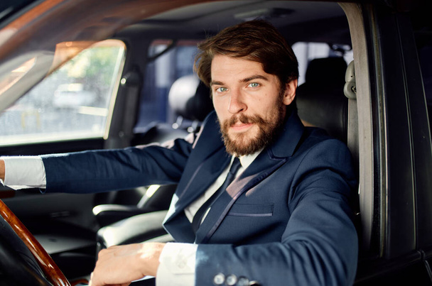 businessman Driving a car. High quality photo - Foto, afbeelding