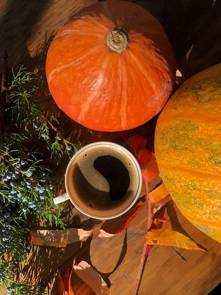 Delicious coffee on an autumn background - Photo, Image