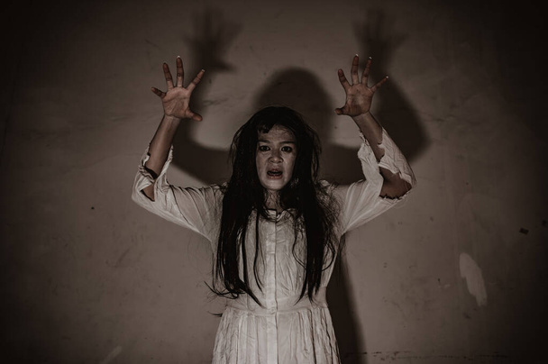 Portrait of asian woman make up ghost face, zombie, Halloween concept - 写真・画像