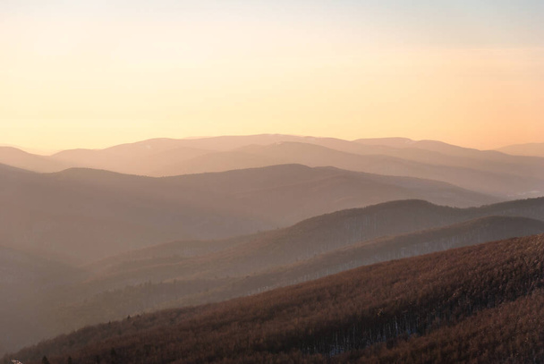 Mountain peaks in the setting sun on a winter day, Bieszczady Mountains, Poland - Photo, image