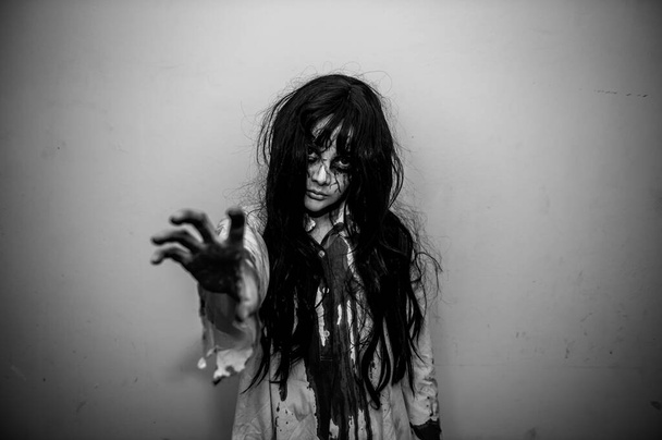 Portrait of asian woman make up ghost face, zombie, Halloween concept - Foto, Imagem