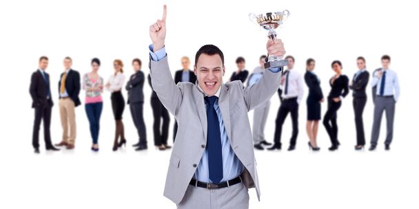 vítězný vůdce businessteam drží trophy - Fotografie, Obrázek