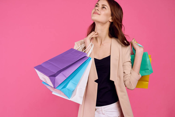 beautiful woman attractive look shopping smile summer style pink background - 写真・画像
