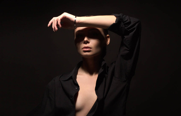 portrait of young beautiful woman. sexy Girl on black background - Valokuva, kuva
