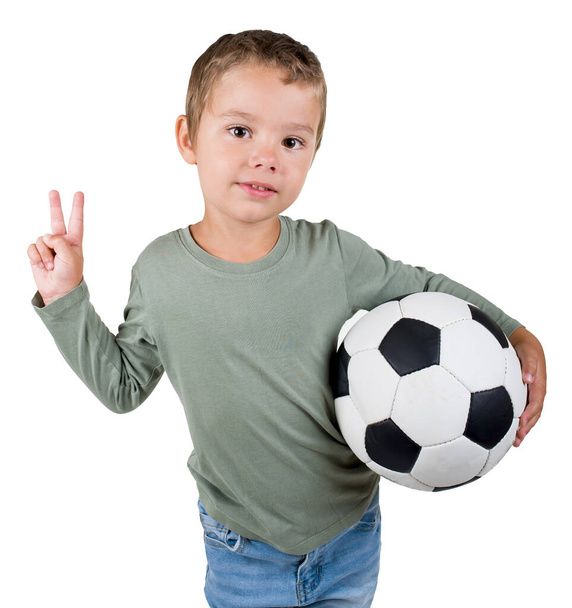 little boy with soccer ball isolated in white. - Φωτογραφία, εικόνα