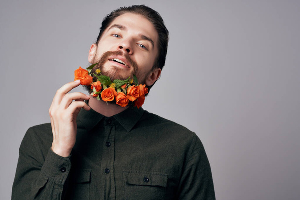 bearded man posing flowers in a beard fashion Studio Lifestyle - Photo, Image