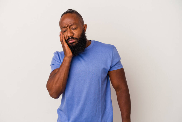 African american man with beard isolated on pink background who is bored, fatigued and need a relax day. - Photo, Image